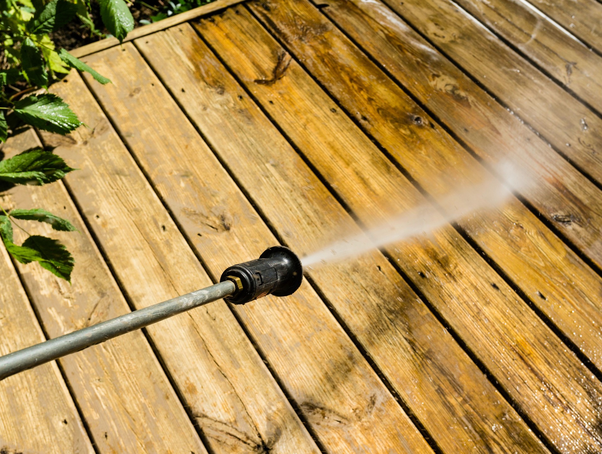 High Pressure Power Washing A Deck